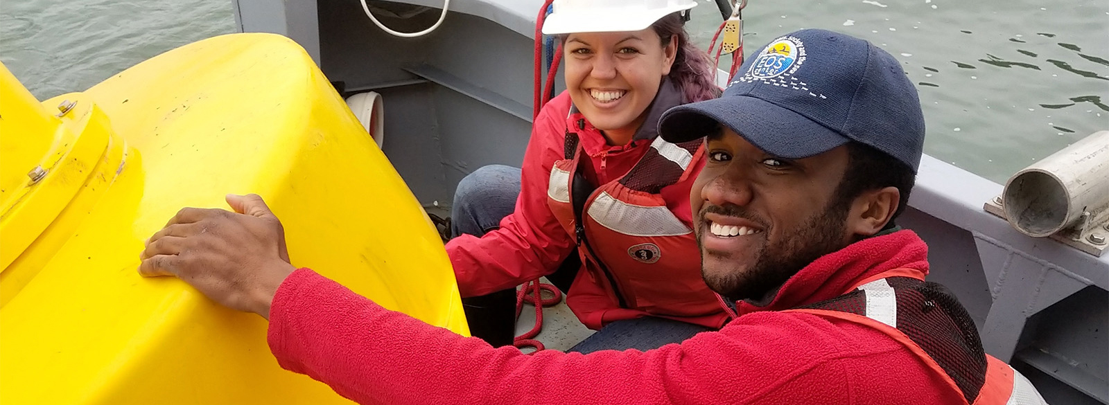 two students on research vessel